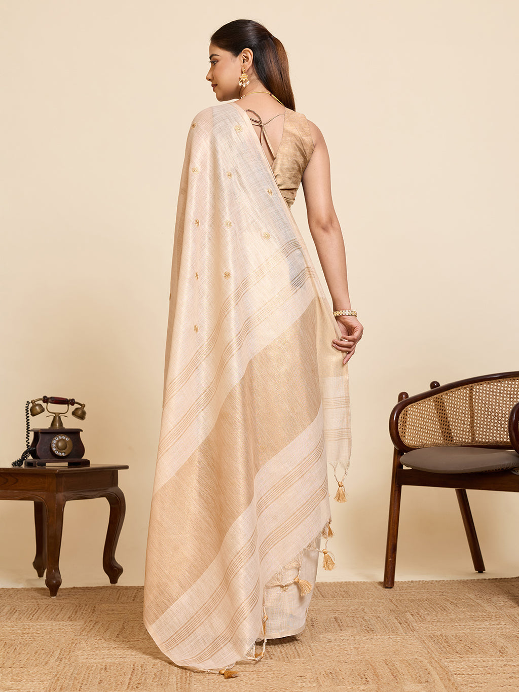 Fabrica Vibe Ivory Linen Cotton Saree with  Embroidery and Golden Woven Motifs & Elegant Tassels