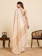 Fabrica Vibe Ivory Linen Cotton Saree with  Embroidery and Golden Woven Motifs & Elegant Tassels