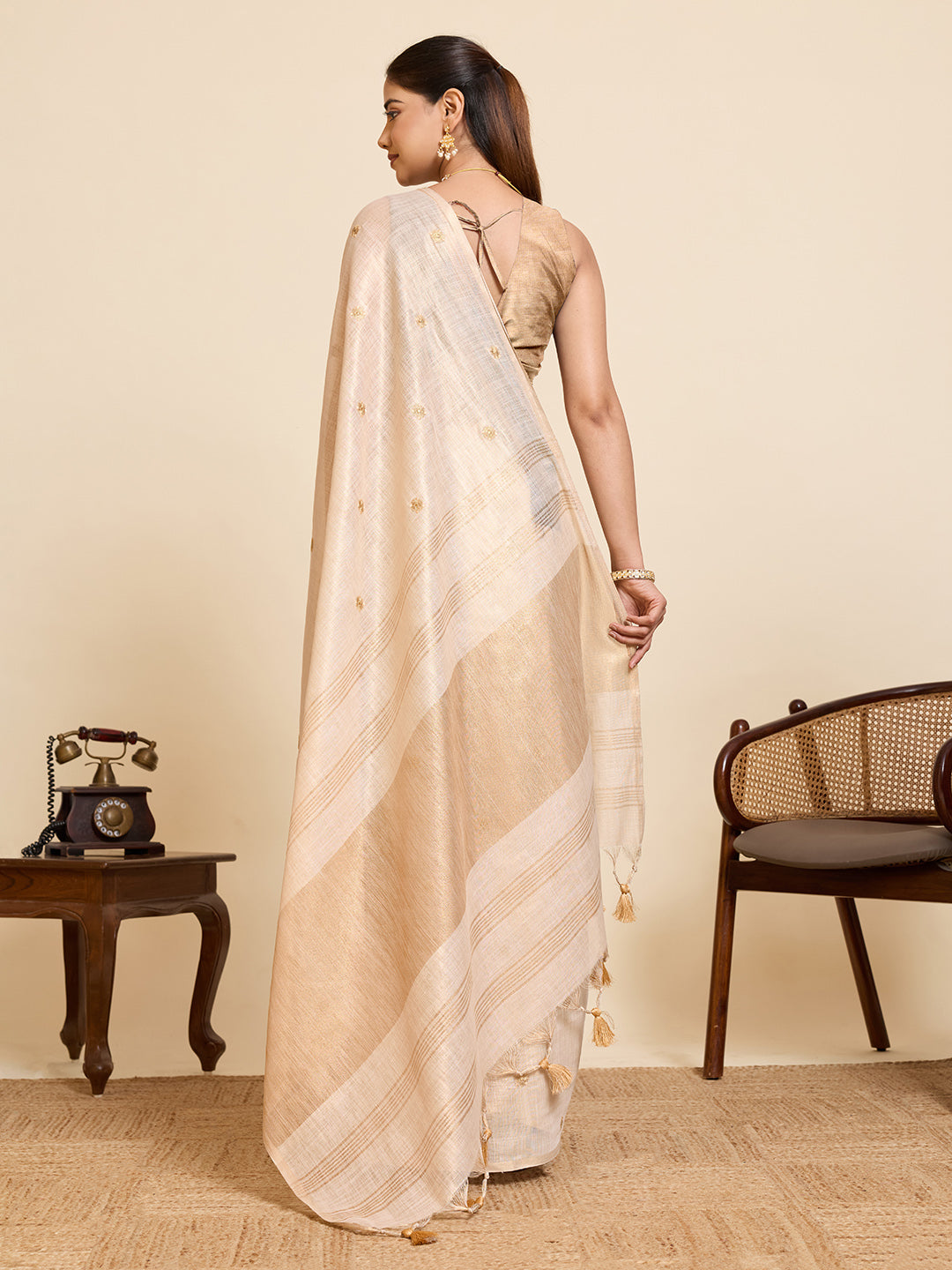 Fabrica Vibe Ivory Linen Cotton Saree with  Embroidery and Golden Woven Motifs & Elegant Tassels