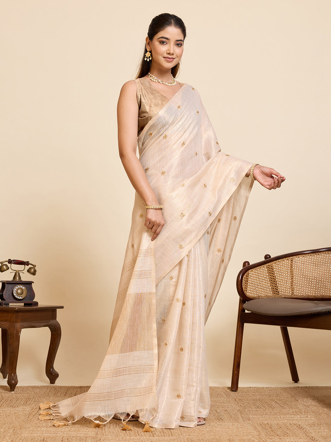 Fabrica Vibe Ivory Linen Cotton Saree with  Embroidery and Golden Woven Motifs & Elegant Tassels
