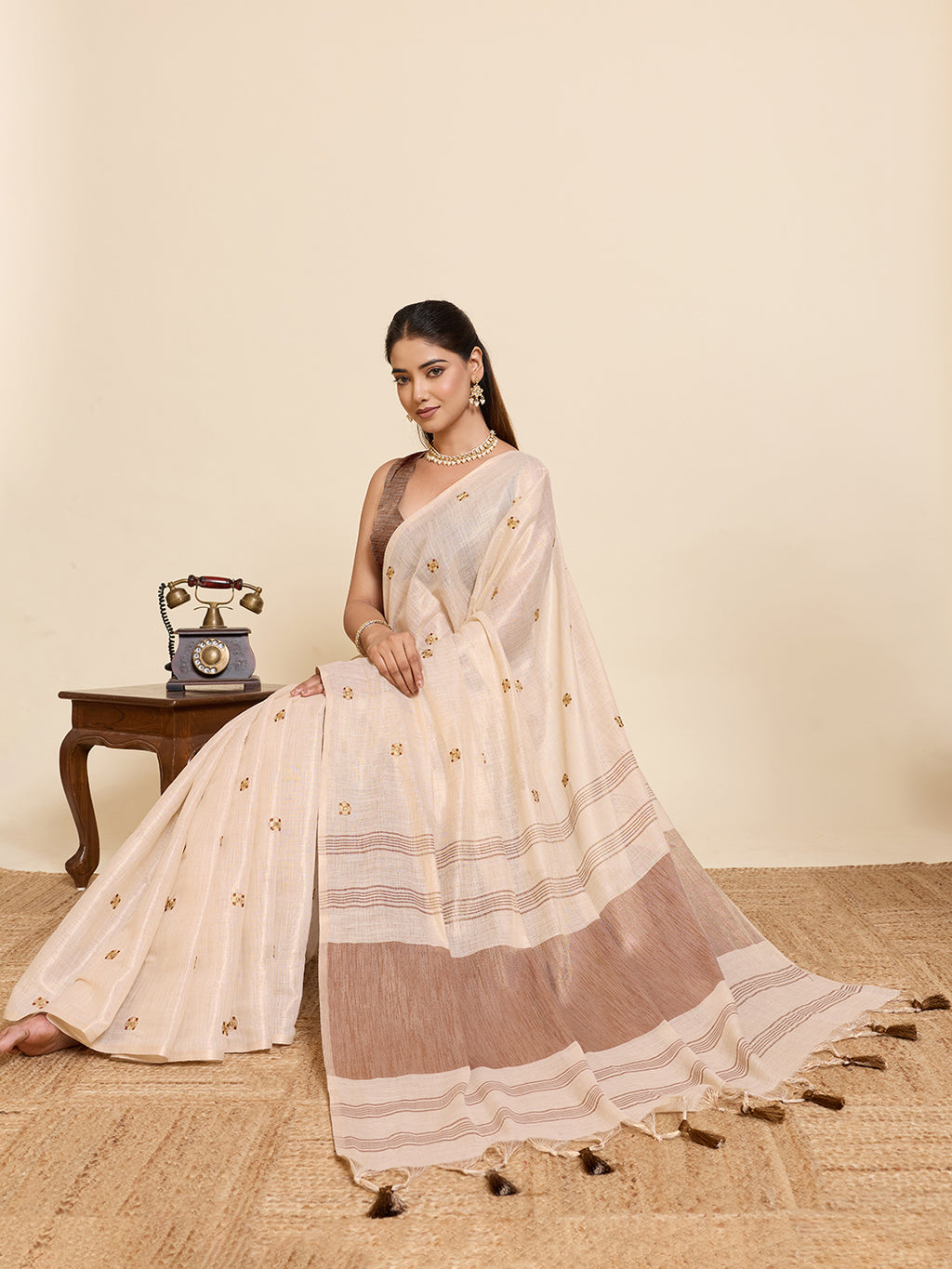 Fabrica Vibe Handwoven Off-White Cotton Linen Saree with Embroidery and Floral Buti & Brown Border