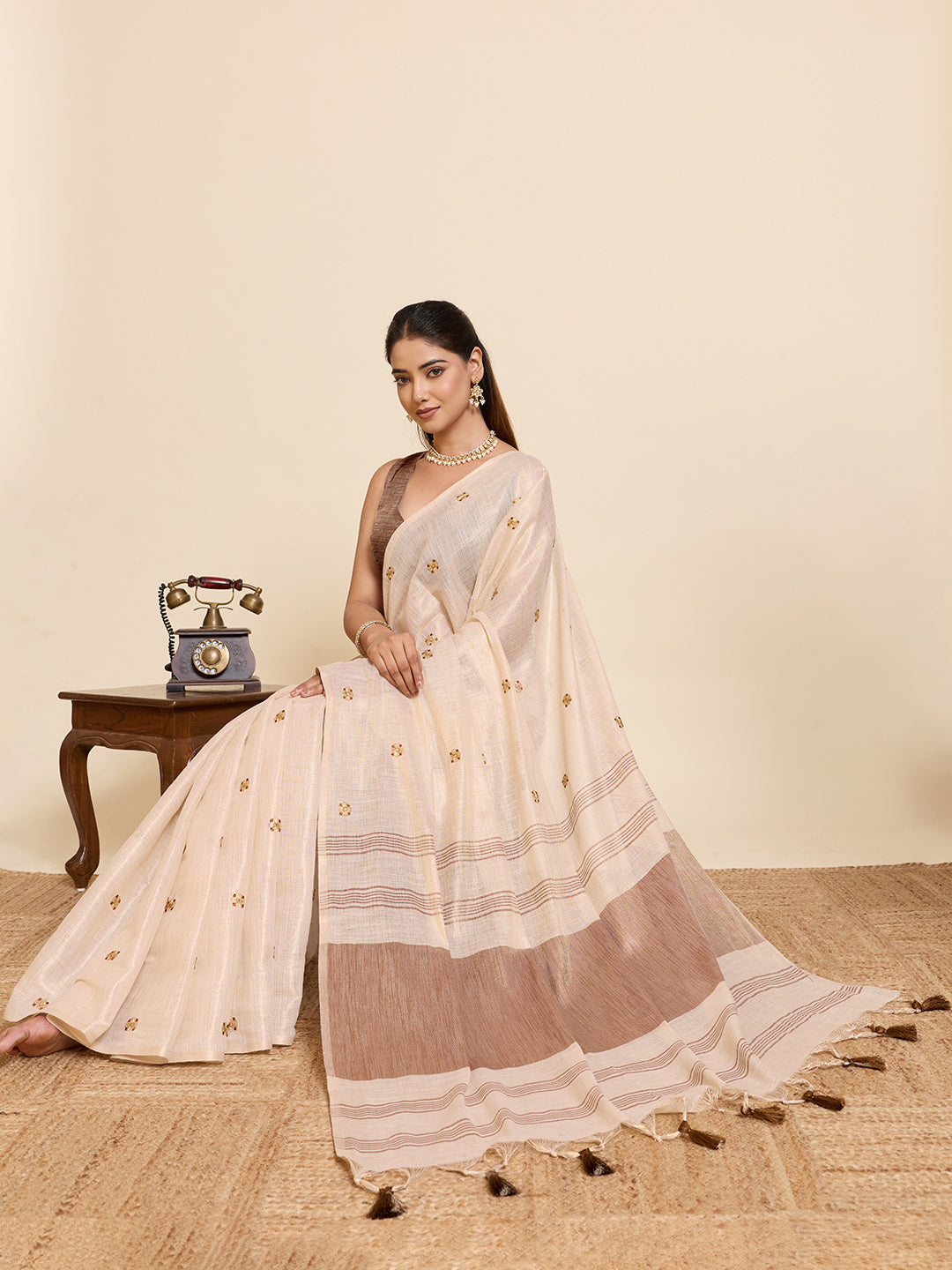 Fabrica Vibe Handwoven Off-White Cotton Linen Saree with Embroidery and Floral Buti & Brown Border