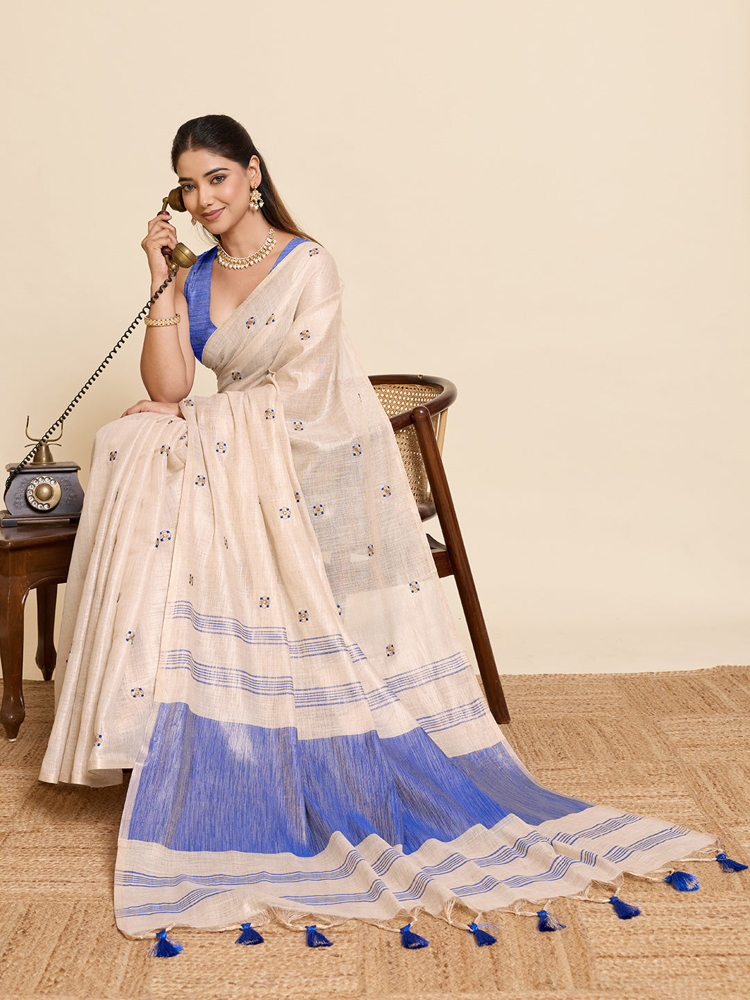 Fabrica Vibe Off-White & BLUE Linen Blend Saree with  Embroidery and Blue Woven Border & Tassel Pallu