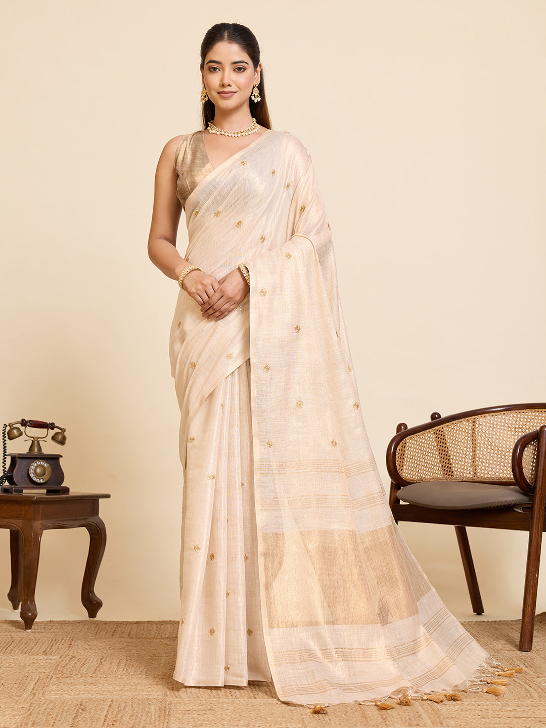 Fabrica Vibe Ivory Linen Cotton Saree with  Embroidery and Golden Woven Motifs & Elegant Tassels