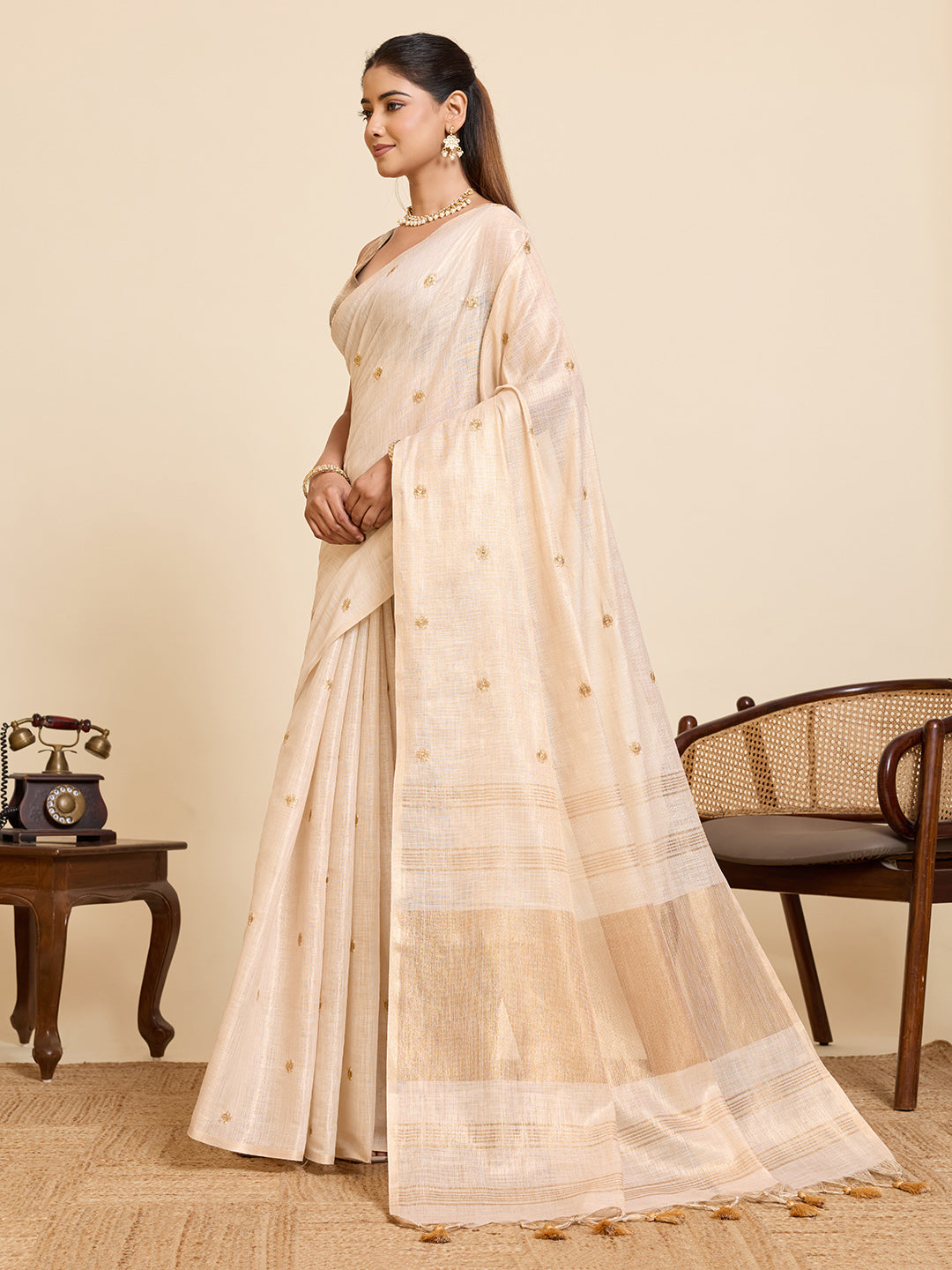 Fabrica Vibe Ivory Linen Cotton Saree with  Embroidery and Golden Woven Motifs & Elegant Tassels