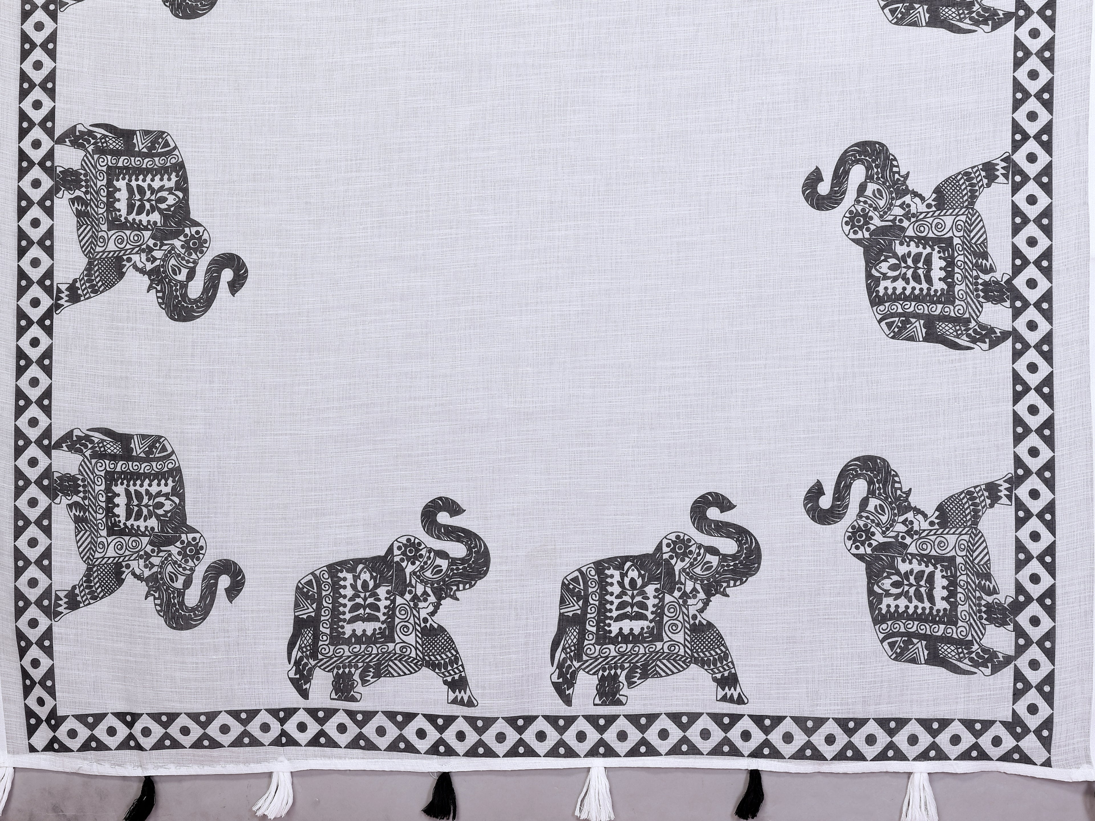 Fabrica Vibe White Soft Linen Saree with Black Elephant Print & Tribal Border Design