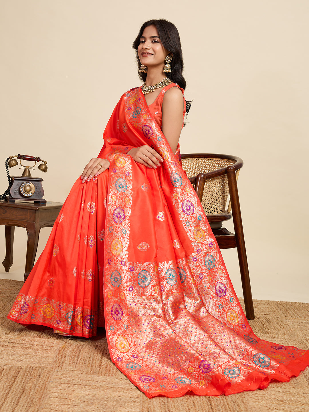 Fabrica Vibe Coral Orange Banarasi Silk Saree with Multicolor Floral Zari Border