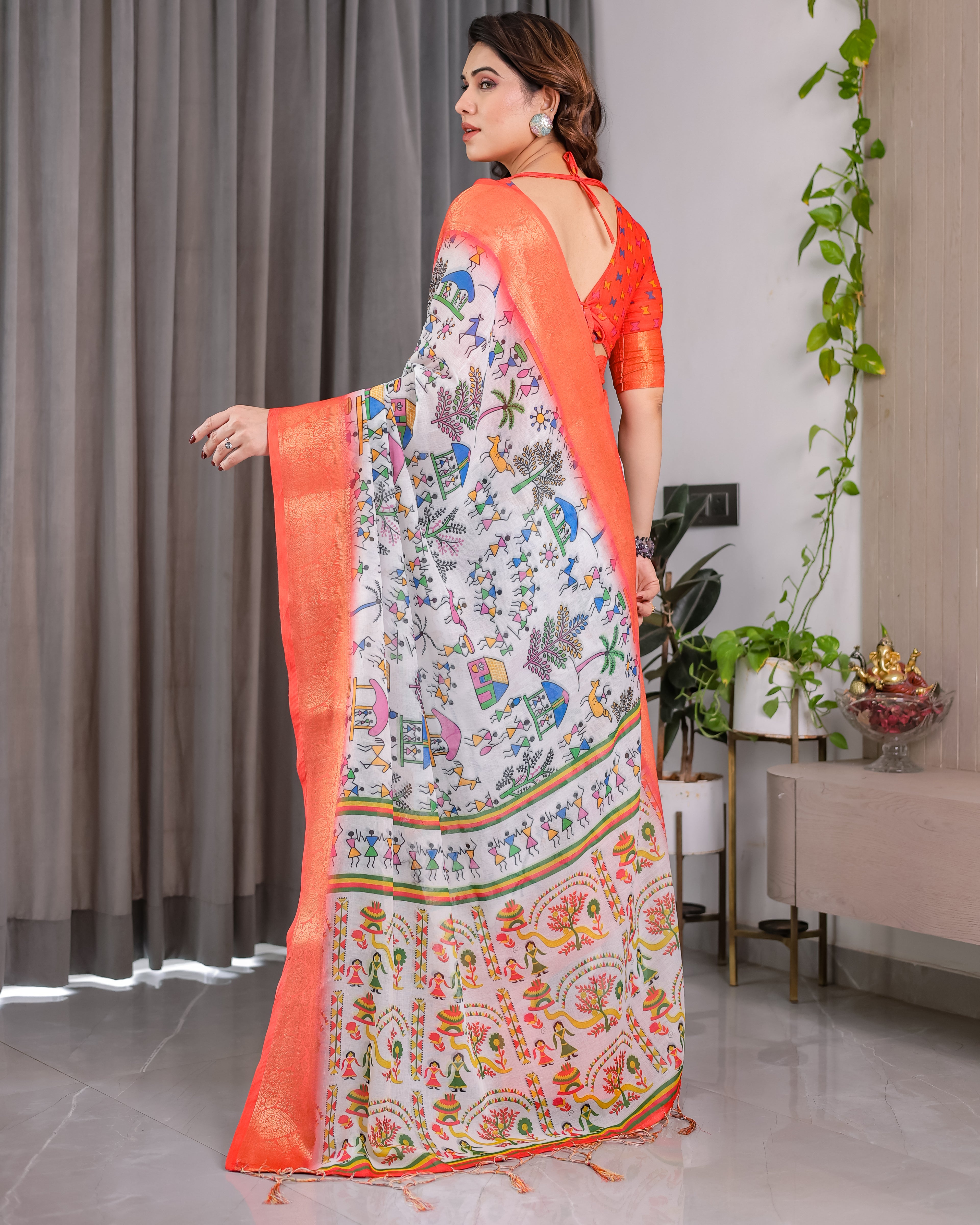 Fabrica Vibe Peach Banarasi Border Linen Saree with Multicolor Tribal Folk Art Print