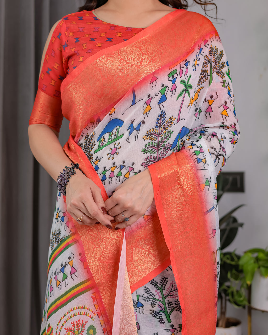 Fabrica Vibe Peach Banarasi Border Linen Saree with Multicolor Tribal Folk Art Print