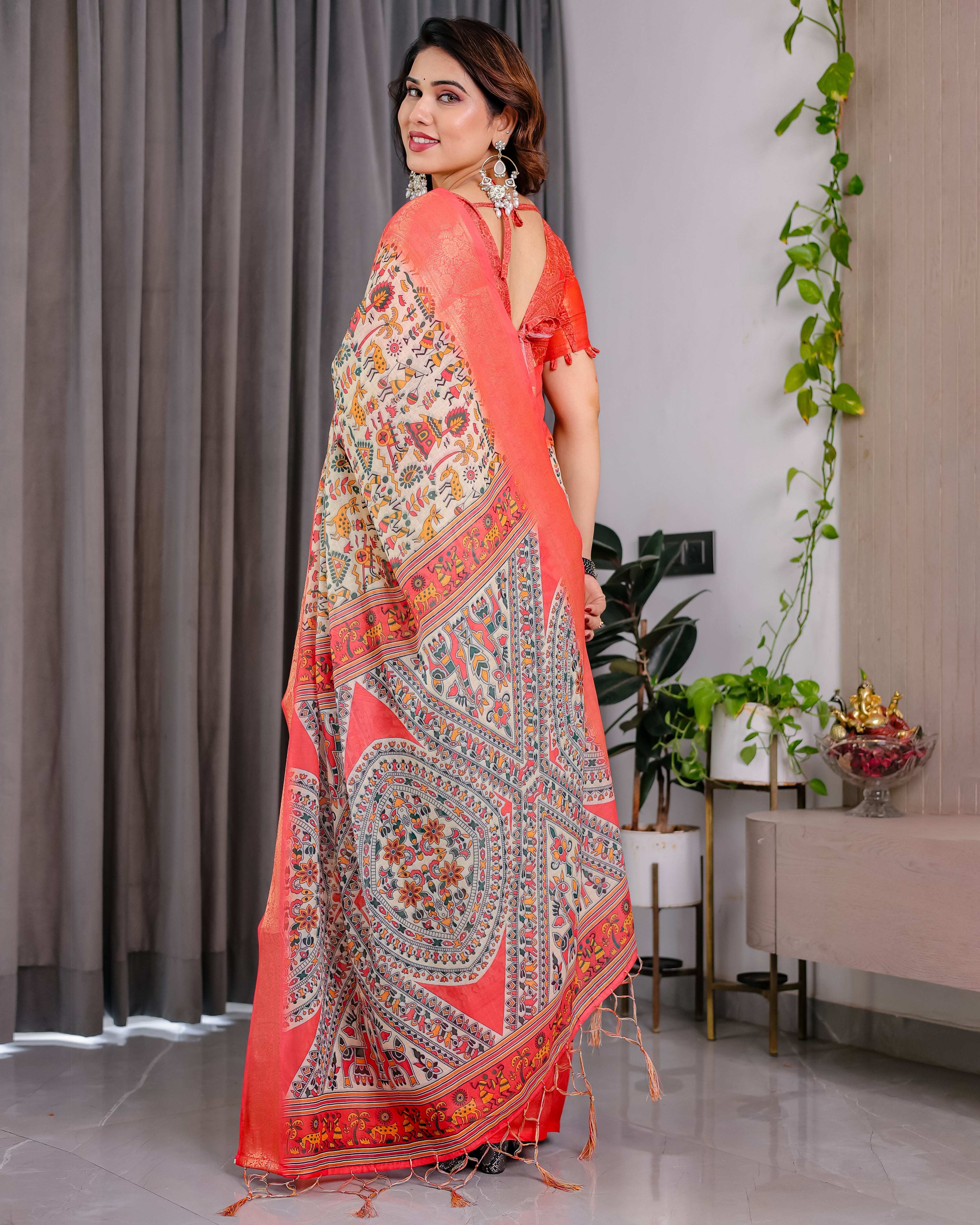 Fabrica Vibe Cream Madhubani Art Printed Linen Saree with Coral Zari Border & Tassel Pallu