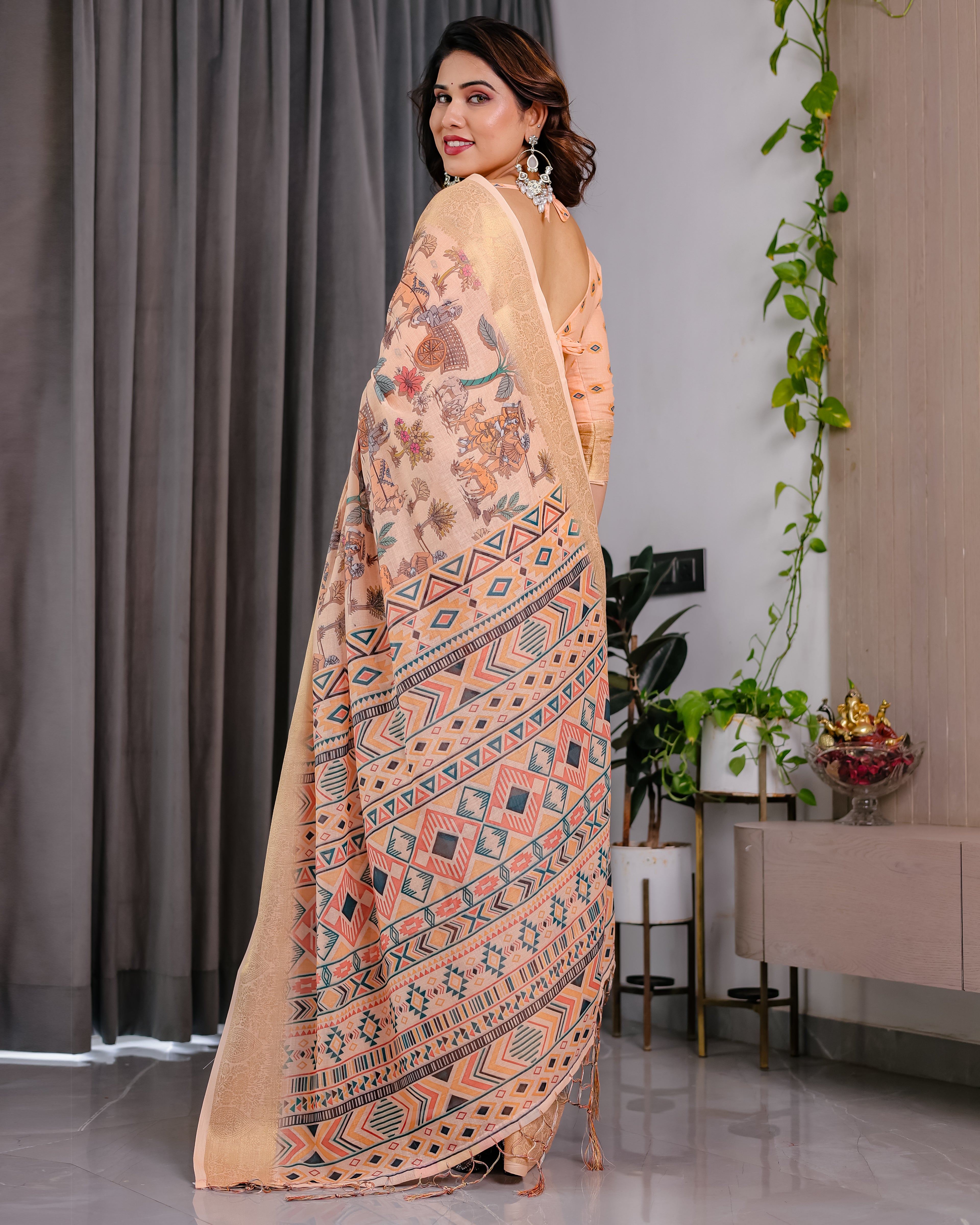 Fabrica Vibe Peach Printed Linen Blend Saree with Rich Gold Zari Border
