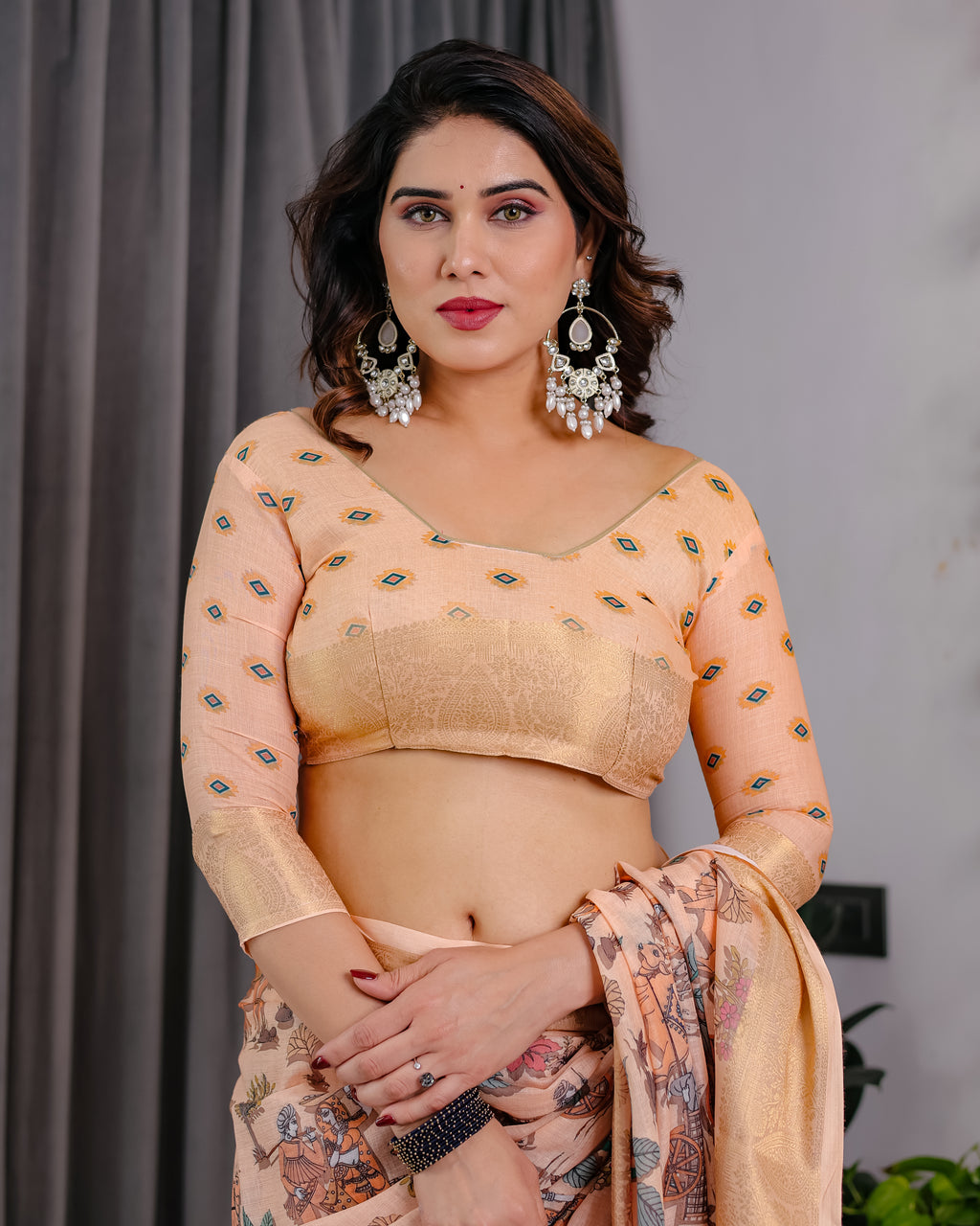Fabrica Vibe Peach Printed Linen Blend Saree with Rich Gold Zari Border