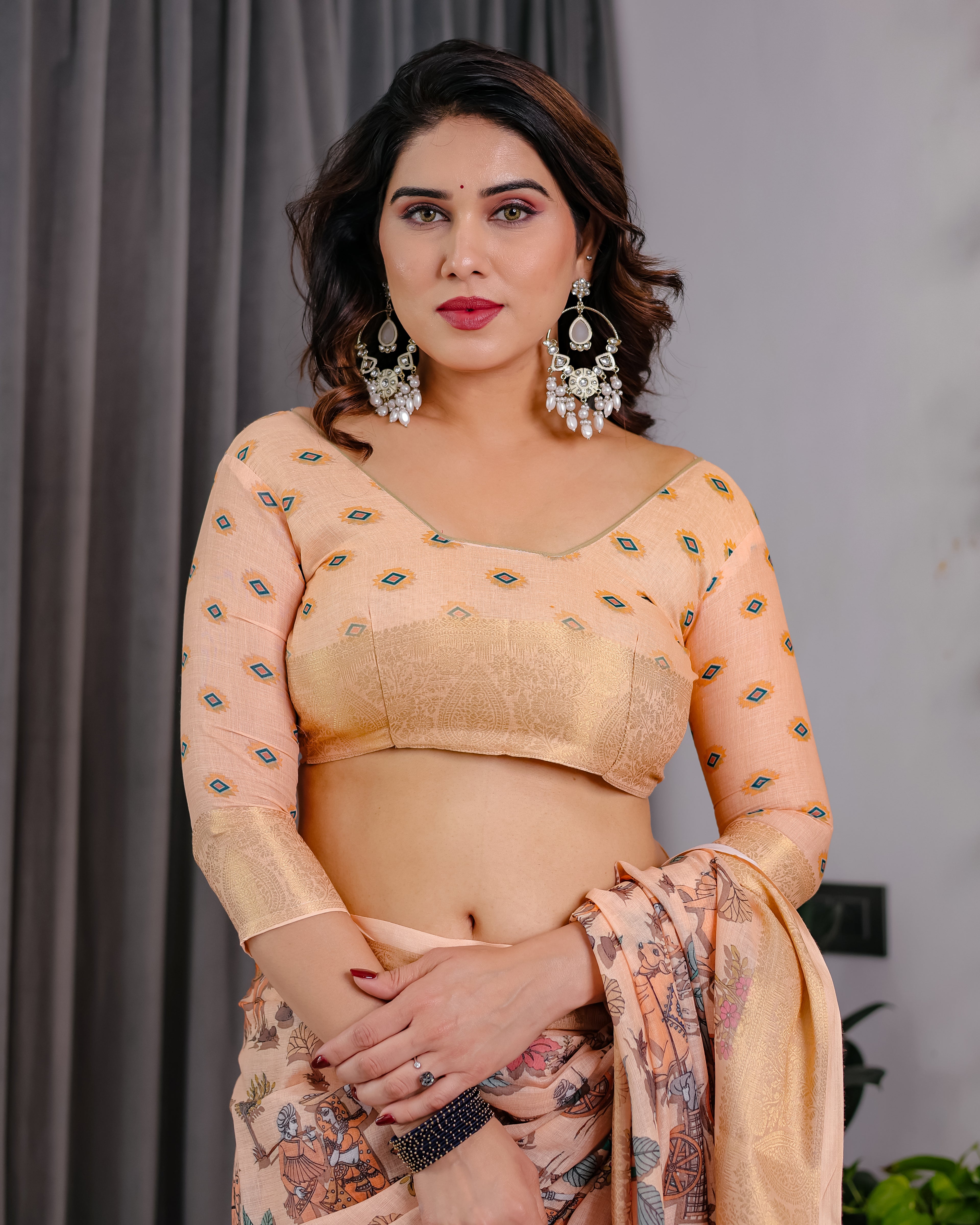 Fabrica Vibe Peach Printed Linen Blend Saree with Rich Gold Zari Border