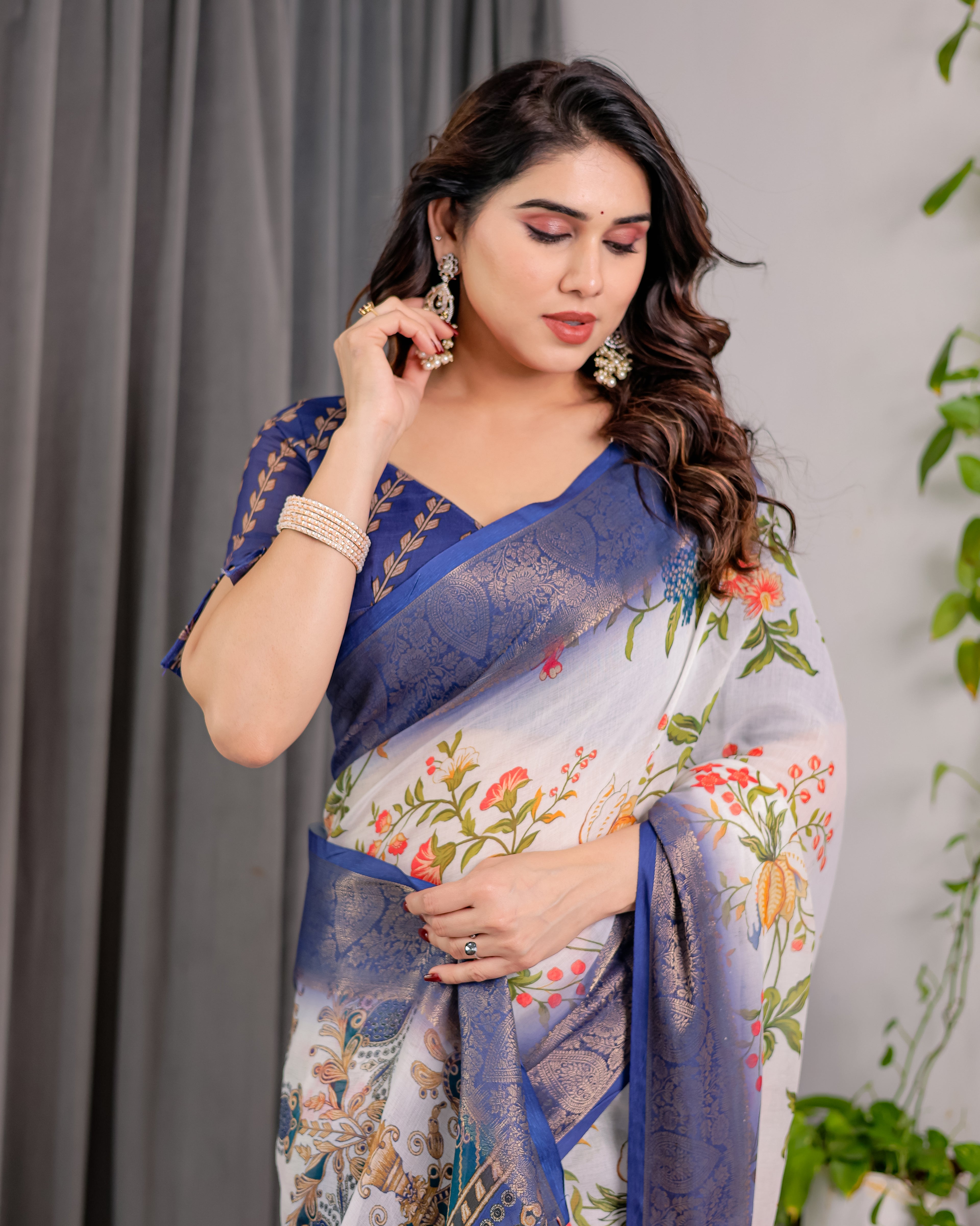 Fabrica Vibe White Floral Printed Linen Blend Saree with Royal Blue Woven Border